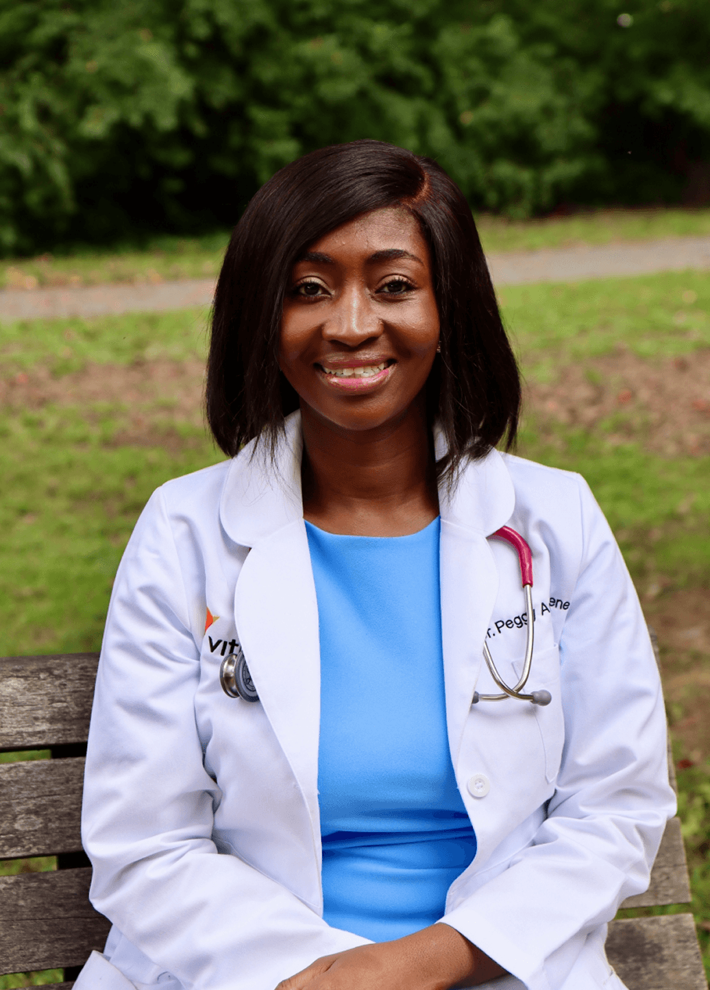 Dr. Peggy (Poku) Amoakohene in her white coat